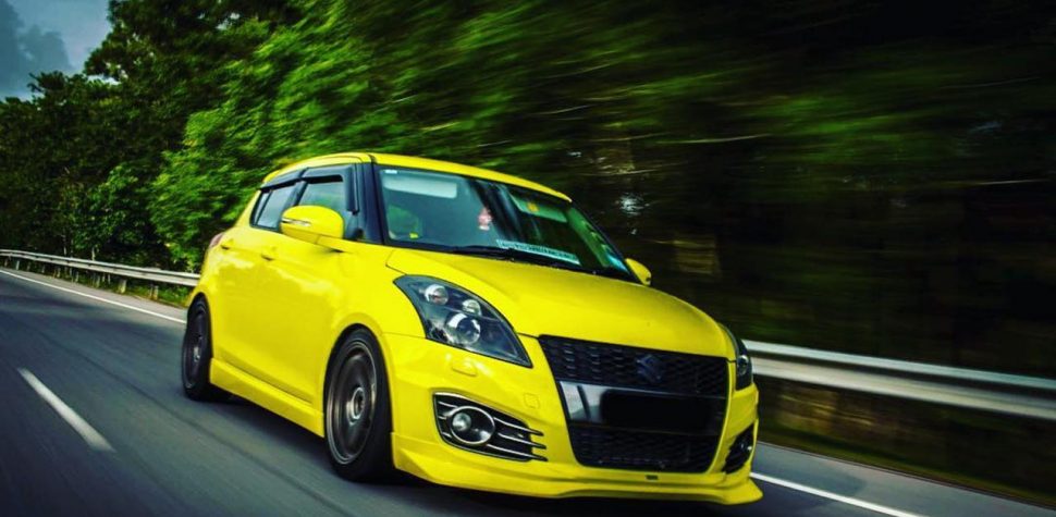 Slammed yellow Suzuki Swift custom