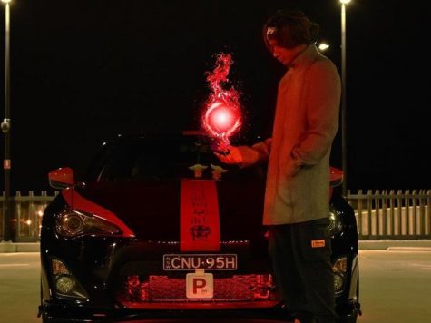 Car guy with Kamehameha flame